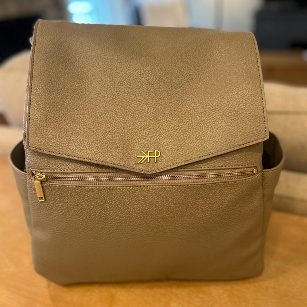 Freshly Picked classic diaper bag ll in the color Fig
Very gently used